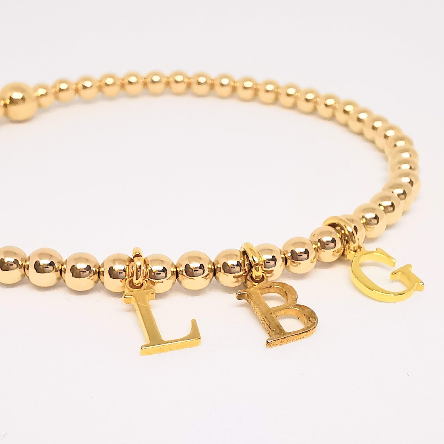 Gold Three Initial Bead Bracelet