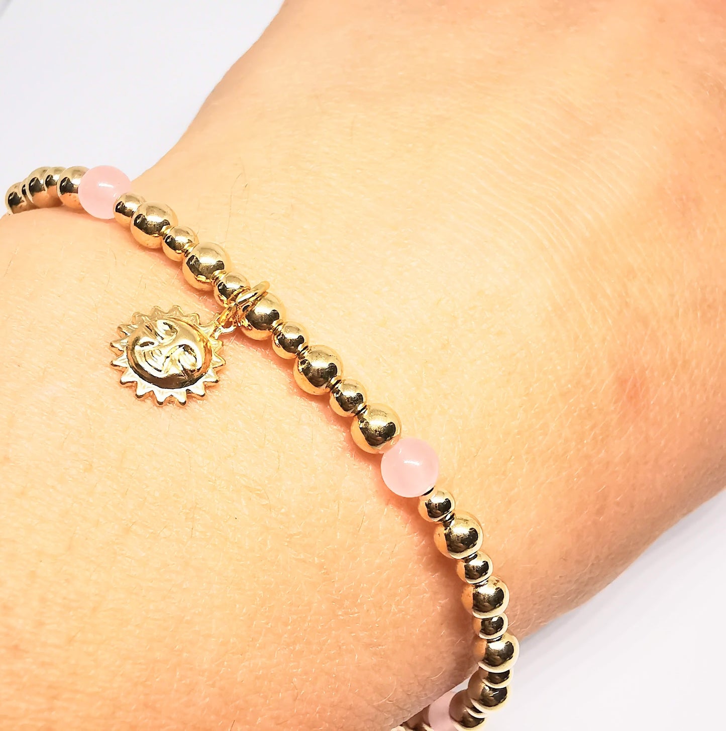 Gold and Rose Quartz Bead Bracelet with Sun Pendant