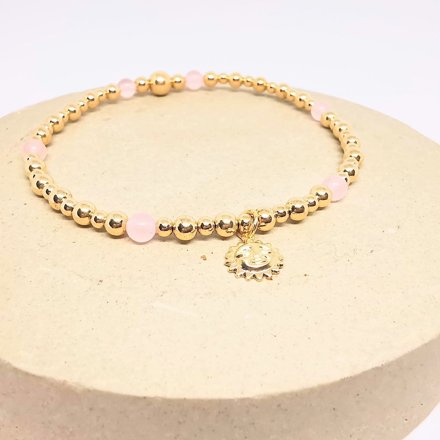 Gold and Rose Quartz Bead Bracelet with Sun Pendant