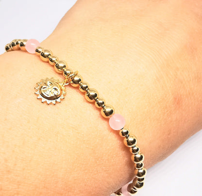 Gold and Rose Quartz Bead Bracelet with Sun Pendant