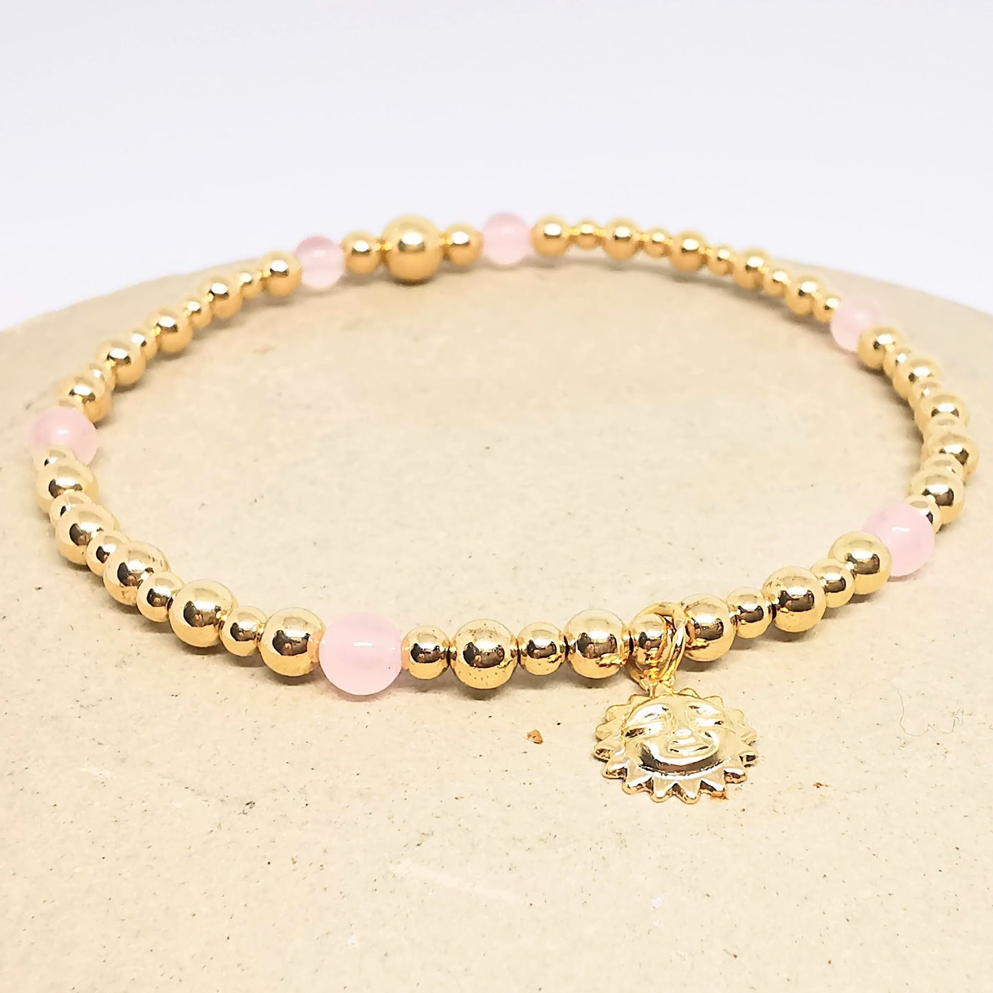 Gold and Rose Quartz Bead Bracelet with Sun Pendant