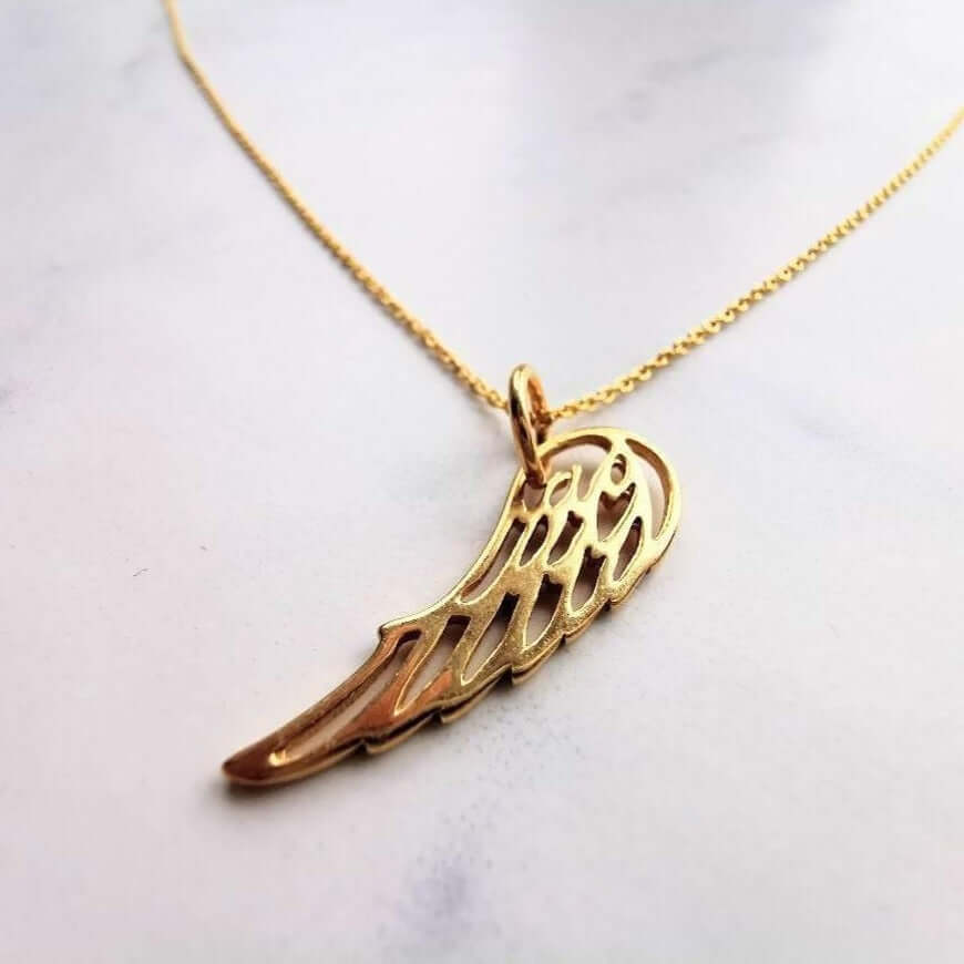 Solid gold angel 2024 wing pendant